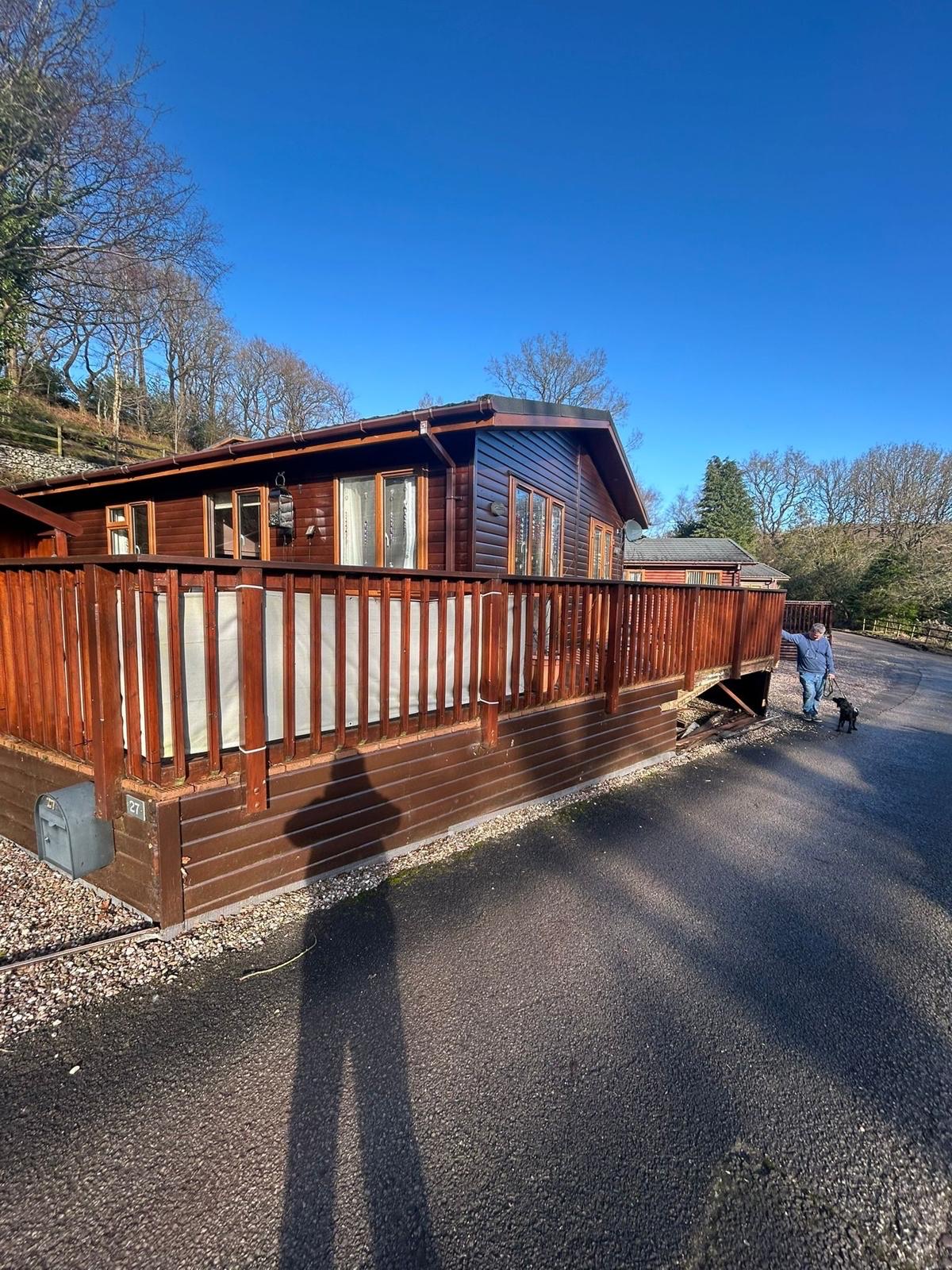 Completed decking with railing on holiday lodge