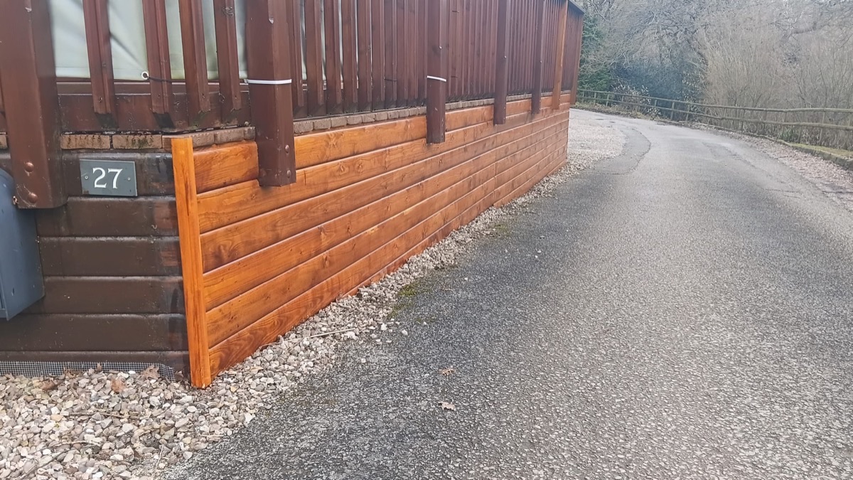 Timber cladding installation, lodge deck